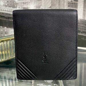 Authentic YSL Sleek black leather bifold wallet